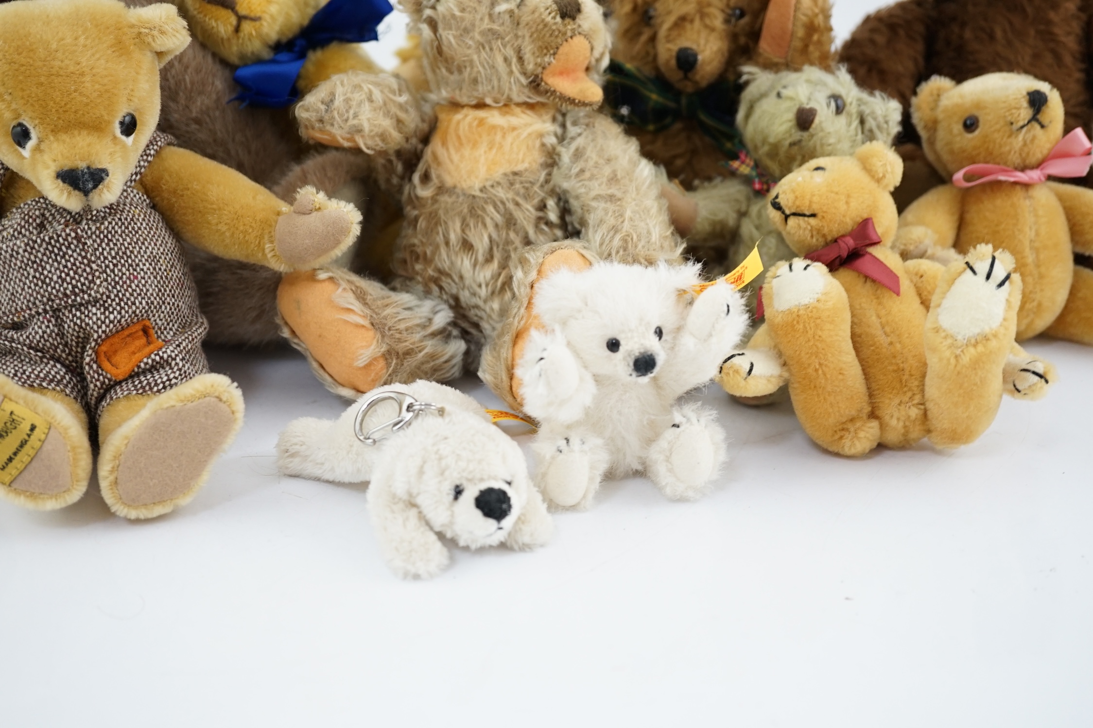 A collection of twenty-six modern teddy bears by The English Teddy Bear Co., Honey Hill Bears, Merrythought, Robin Rive, Steiff, etc.